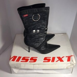 Edgy black stiletto boots